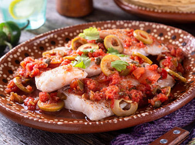Robalo alla Veracruzana - Filetto di pesce con olive, capperi e pomodoro